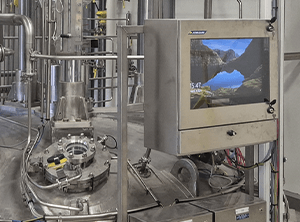 A stainless PC HMI Enclosure installed in manufacturing facility