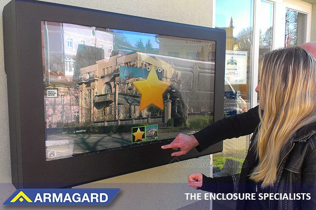 Outdoor touch screen digital signage outside a business